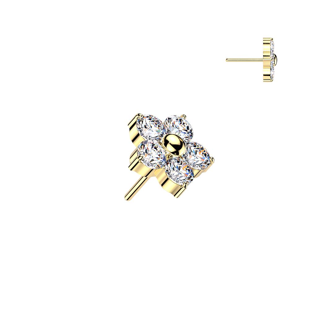 Gold labret with a four-petal flower cluster of clear round gemstones